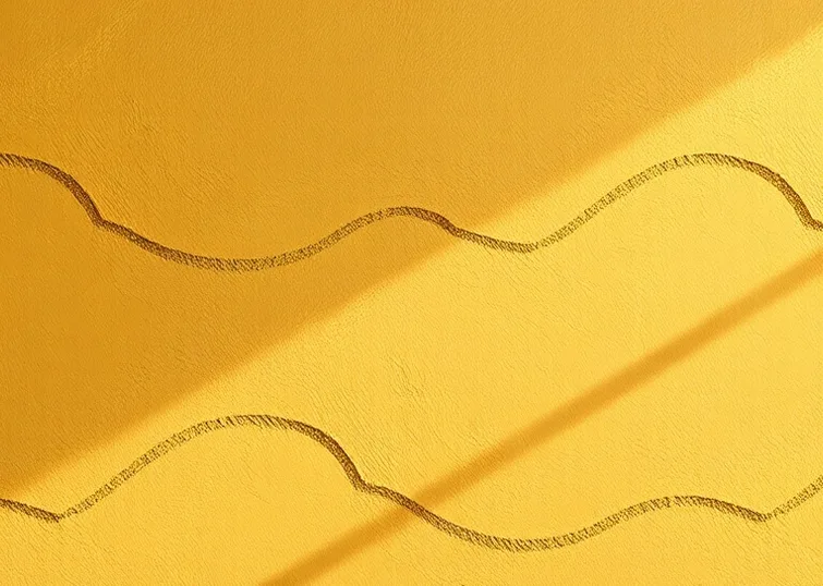 Application d'un enduit décoratif à la lisseuse sur un mur