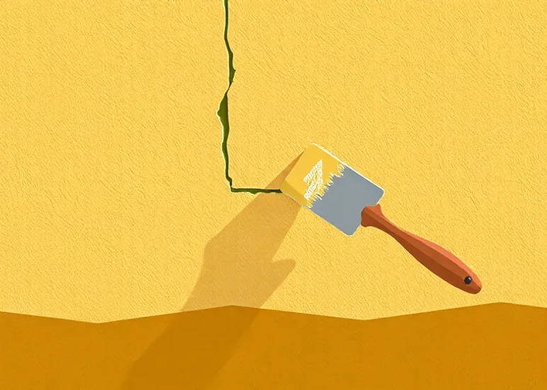 Ponçage et rebouchage des fissures avant mise en peinture